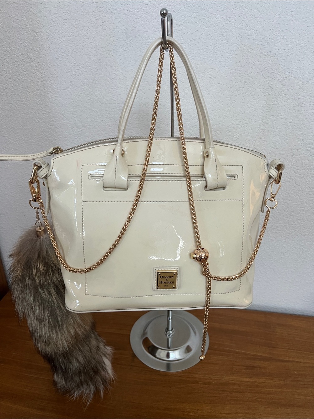Dooney and Bourke cream patten leather